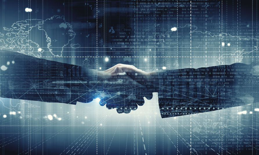 Close up of business handshake on digital background